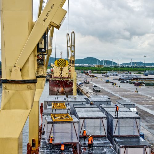 ฉargo loading into the ship in port shipyard